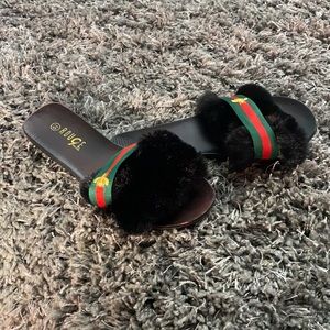 Pair of house slippers or casual outdoors slippers